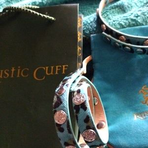 Two turquoise cow hide rustic cuff bracelets